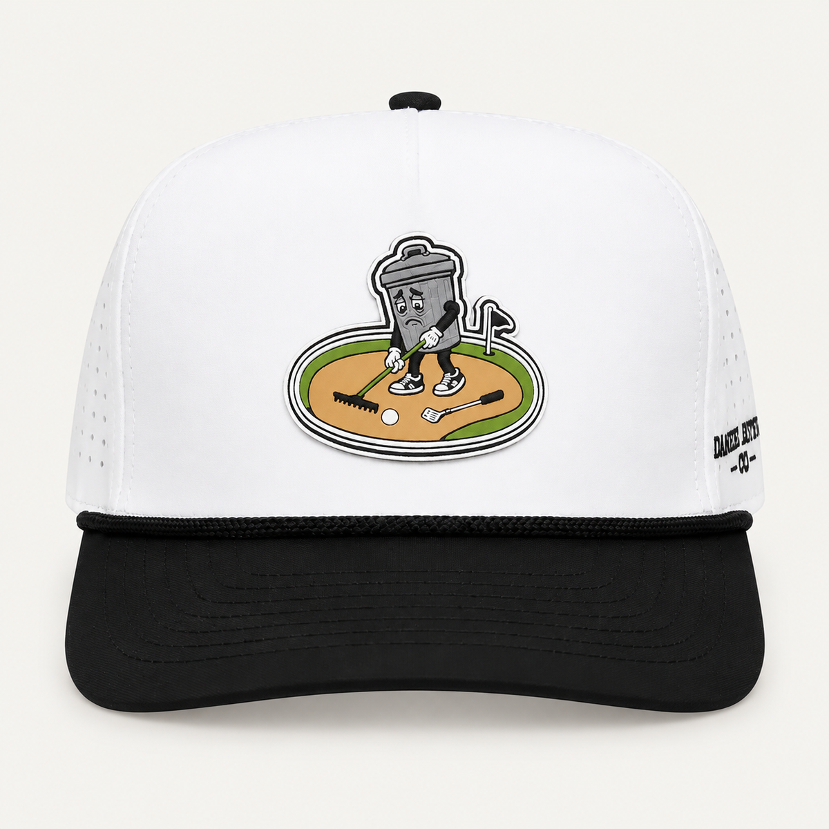 Front view of the white and black Basura Bunker cap with a trash-can golfer sand-trap patch.