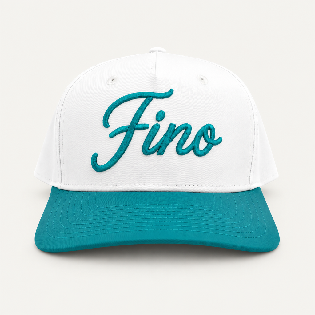 Front view of the white and teal Fino snapback with teal script embroidery and a teal brim.