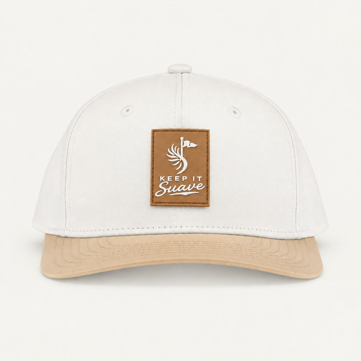 Keep It Suave snapback with cream crown, beige brim, and beige logo patch, front view.